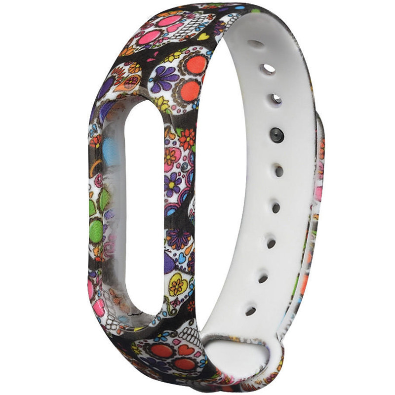 

Силіконовий ремінець з малюнком для Xiaomi Mi Band 5 / 6 (Кольорові черепа / Чорний) 926016